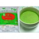 Упаковка и чашка с тайским молочным зеленым чаем